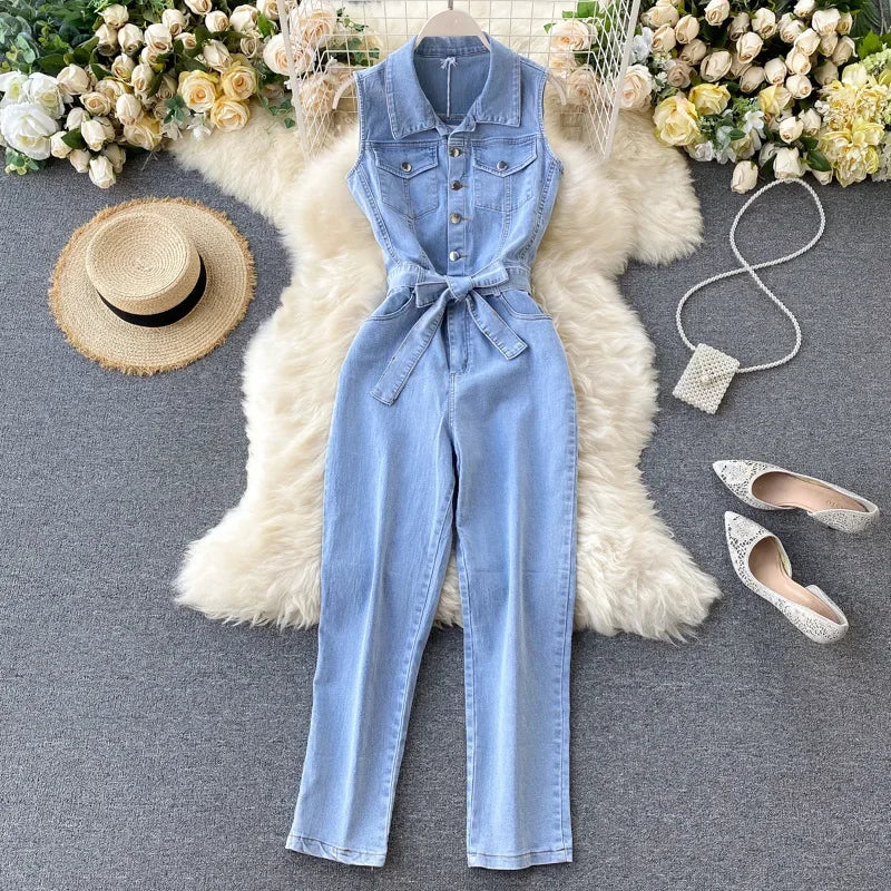 Stylish Sleeveless Denim Jumpsuit with Turn-Down Collar and Single Breasted Pockets, perfect for summer outings.