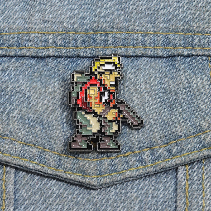 Shooting Game Enamel Pin Cool Brooch for Men Anime Fans Jewelry Accessory adds unique flair to any outfit. Perfect for collectors!