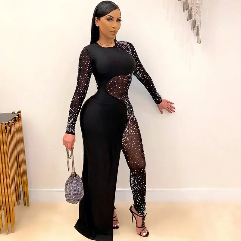 Stunning woman in an Elegant Rhinestone Long Sleeve Sheer Mesh Patchwork Skinny Jumpsuit for luxury night parties.