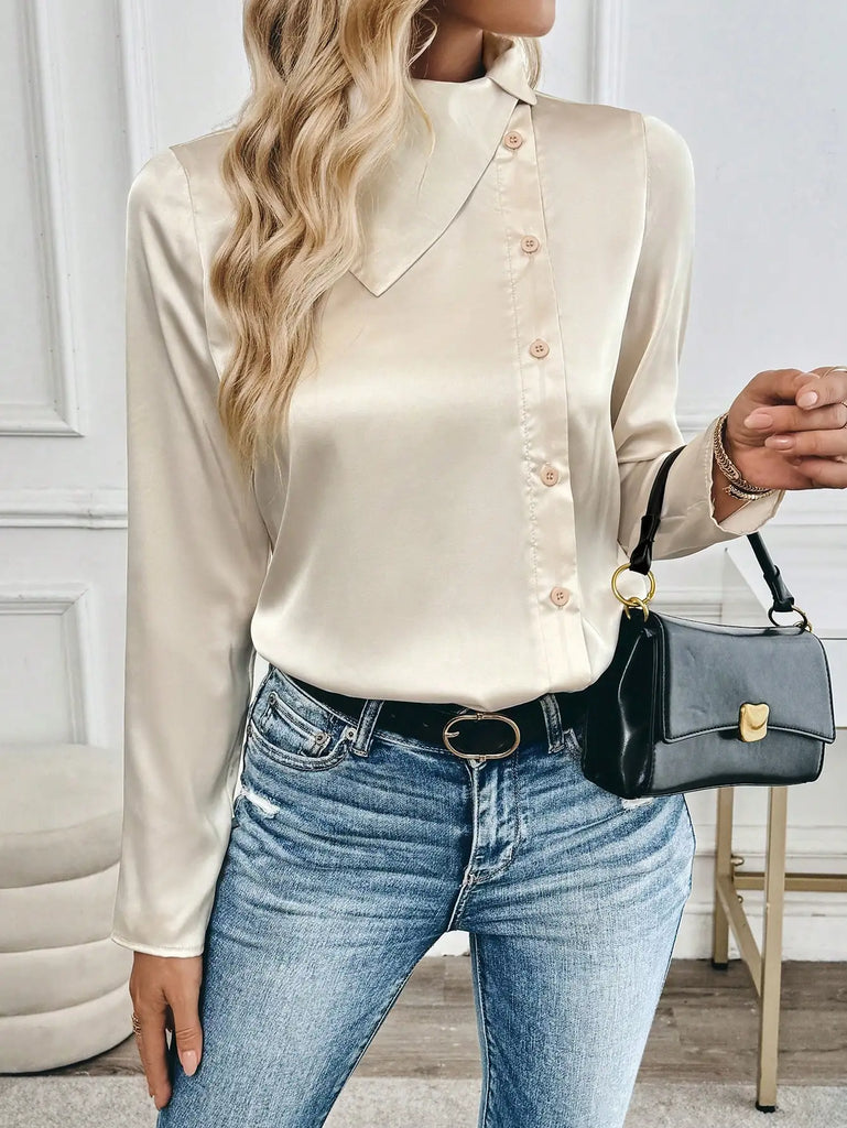 Stylish woman wearing an Elegant Asymmetrical Profiled Lapel Long Sleeve H-Line Fall Winter Shirt for Women with jeans.