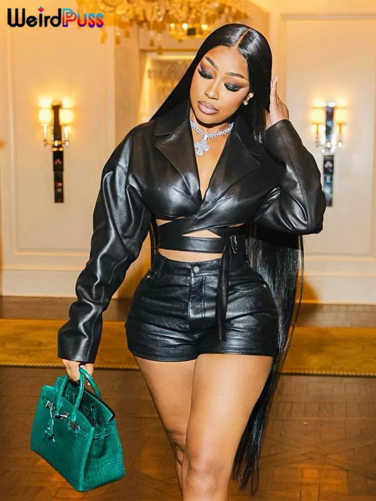 Stylish woman in a Sexy PU Leather Two Piece Set V Neck Crop Top and Shorts, perfect for fall streetwear by Weird Puss.