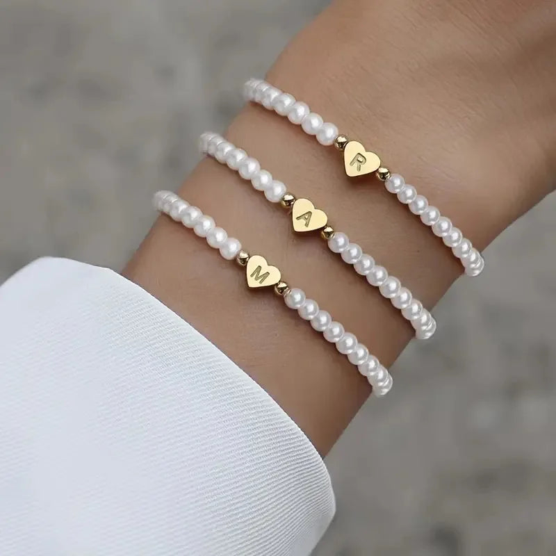 Stylish 26 Letters Initial Pearl Bracelet for Women, perfect faux pearl jewelry gift A-Z for any occasion.