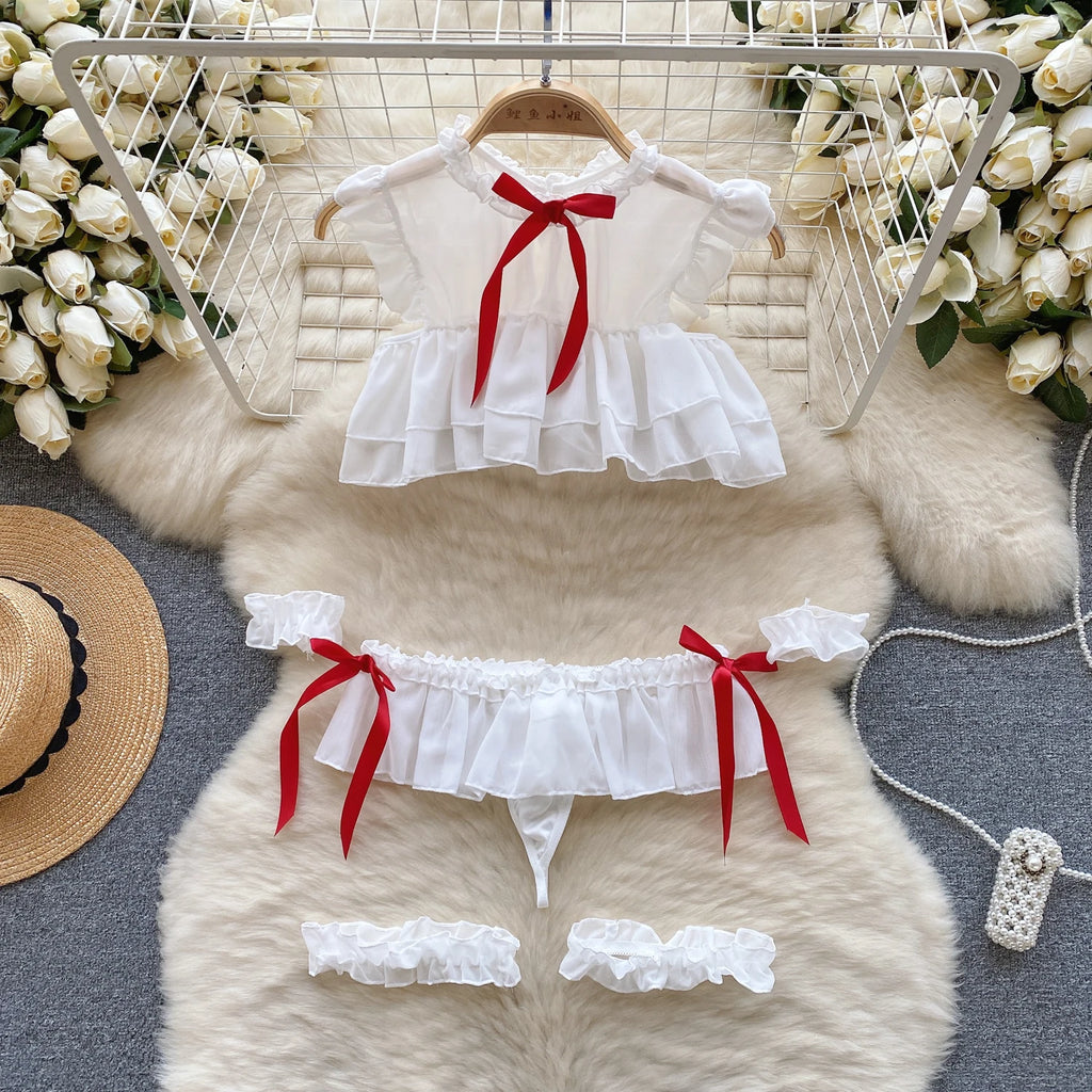 Shop the Sweet Sexy 4-Piece Pajama Set with sheer hollow flying sleeves, ruffled crop top, and mini pleated skirt.