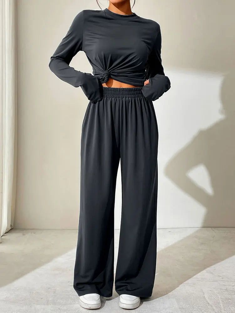 Elevate your look with the Spring Fashion Women's Casual Long Sleeve T-Shirt and Trouser Set Slim Fit Streetwear Outfit.