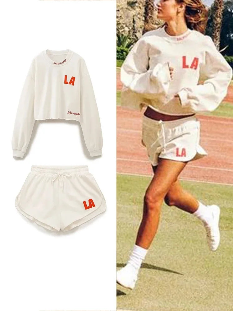 Stylish Women's O Neck Printed Fleece Sweatshirt and Elastic Waist Drawstring Shorts Two Piece Casual Lounge Set for comfy wear.