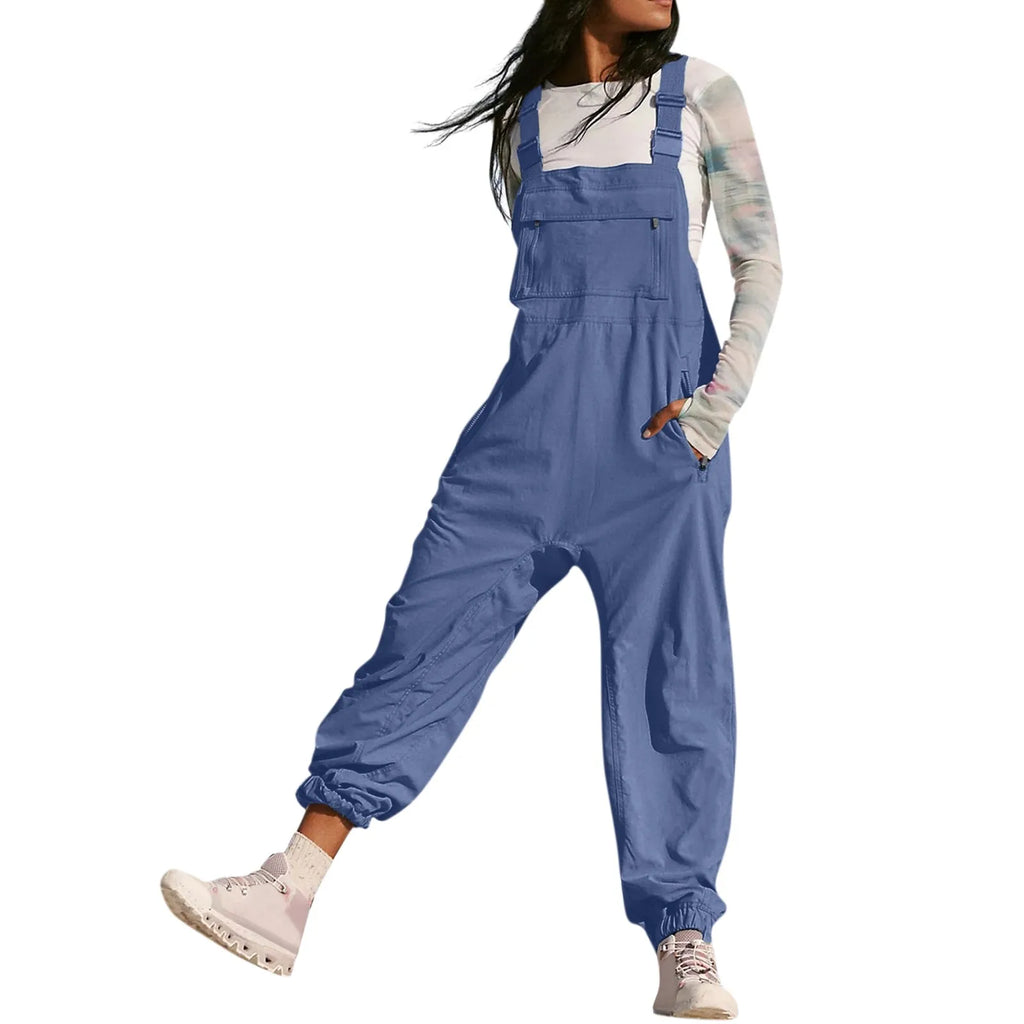 Stylish Women’s Summer Casual Loose Wide Leg Jumpsuit with Adjustable Straps, pockets, and retro button detail in blue.