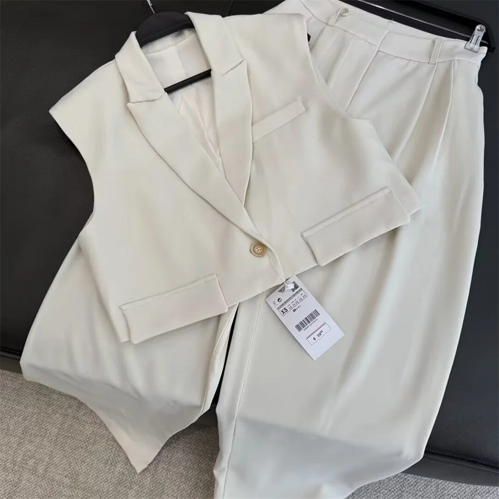 Stylish Flip Cover Decor Short Vest and Wide Leg Long Pants Set for Effortless Chic and Slimming Silhouette in cream.