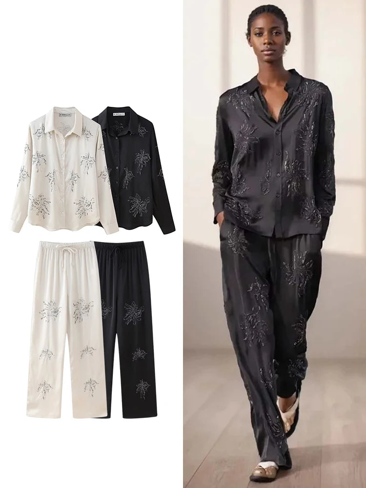 Elevate your style with the Women's Beaded Embroidery Long Sleeve Shirt and Loose Trousers Set with Lace Up Details.