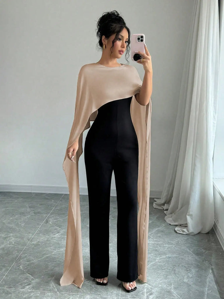 Sophisticated and stylish, the Elegant Womens Autumn Winter Jumpsuit with Fake Two Capes Patchwork Design offers comfort and elegance.