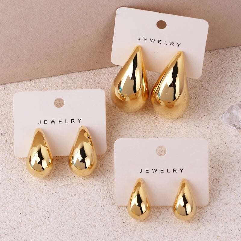 Stunning Extra Large Chunky Hoop Earrings for Women, lightweight, hypoallergenic, and gold plated for bold elegance.