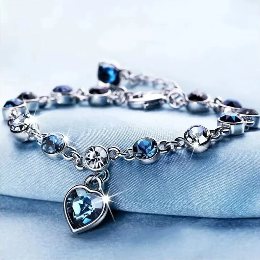 Elegant Women Silver Color Lucky Bracelet with Blue Crystal Heart Charm for Bridal Wedding Engagement Gift, perfect accessory.