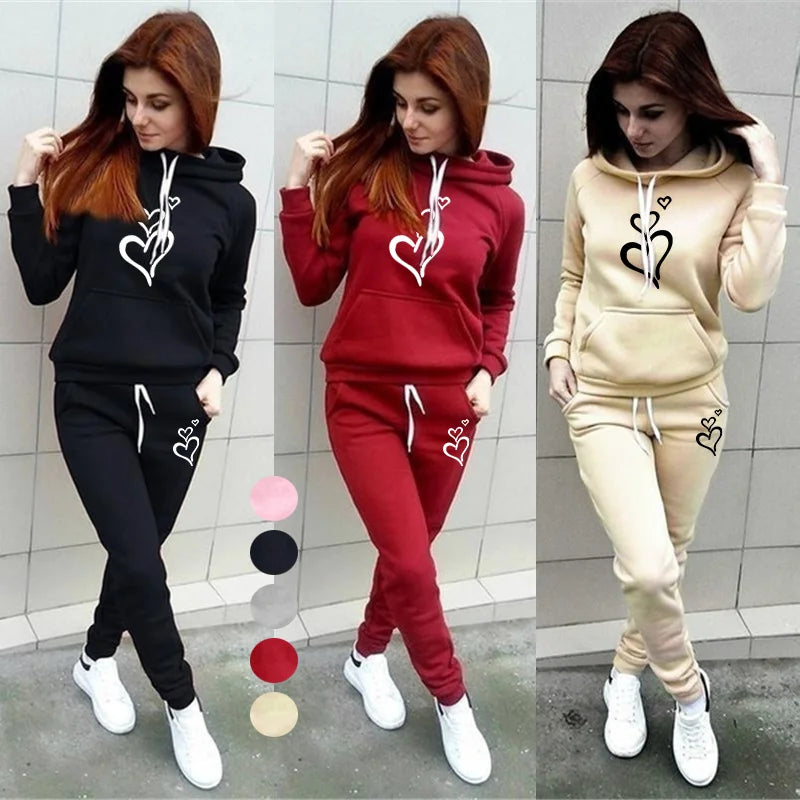 Stylish Women's Harajuku Style Love Print Hooded Jogging Set for Autumn and Winter Fashion in black, red, and beige.