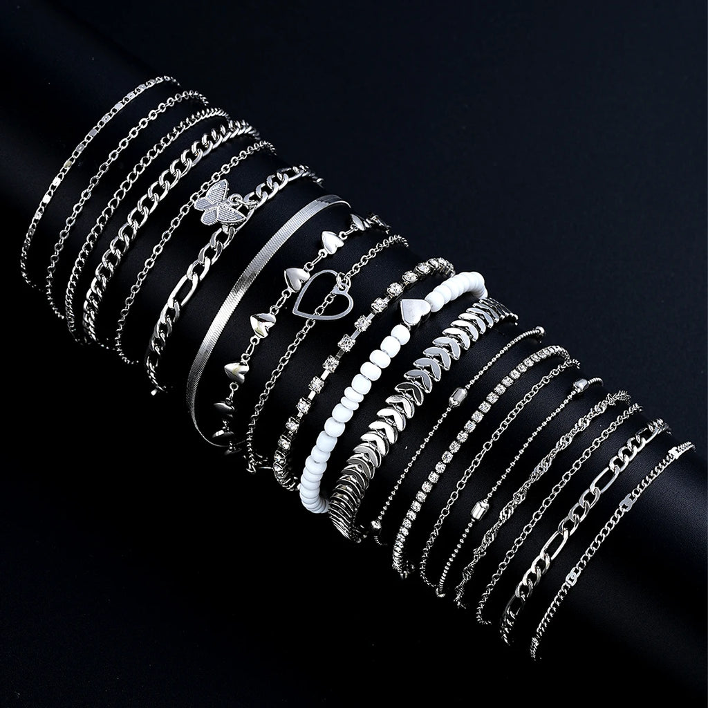 Stunning 19 Pieces Silver Color Anklet Set for Women with Pearl Butterfly Heart and Crystal Foot Chains for daily fashion.
