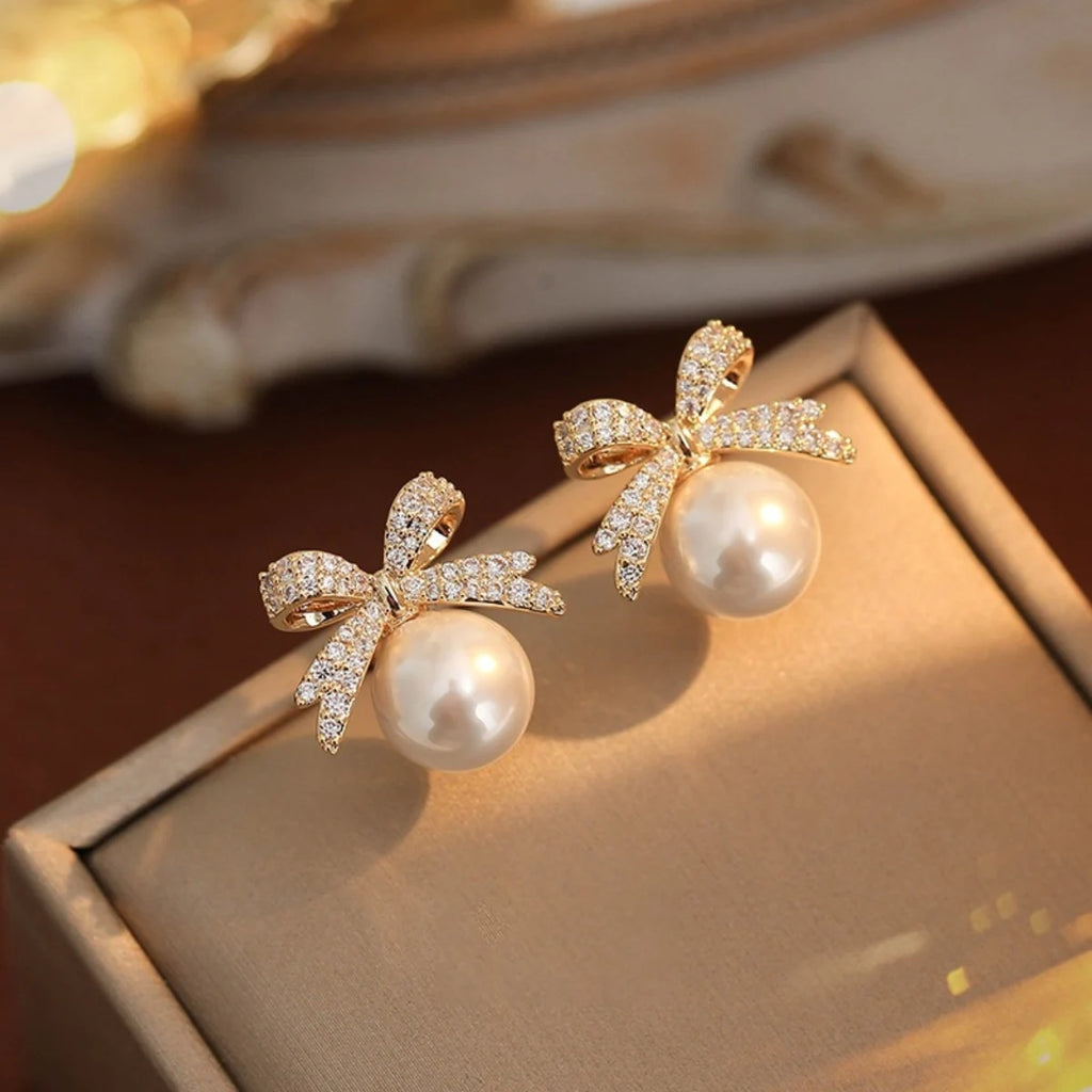 Stunning Women's Bowknot Diamond Pearl Earrings in Silver, Unique High-End Fashion Jewelry, perfect for elegant occasions.