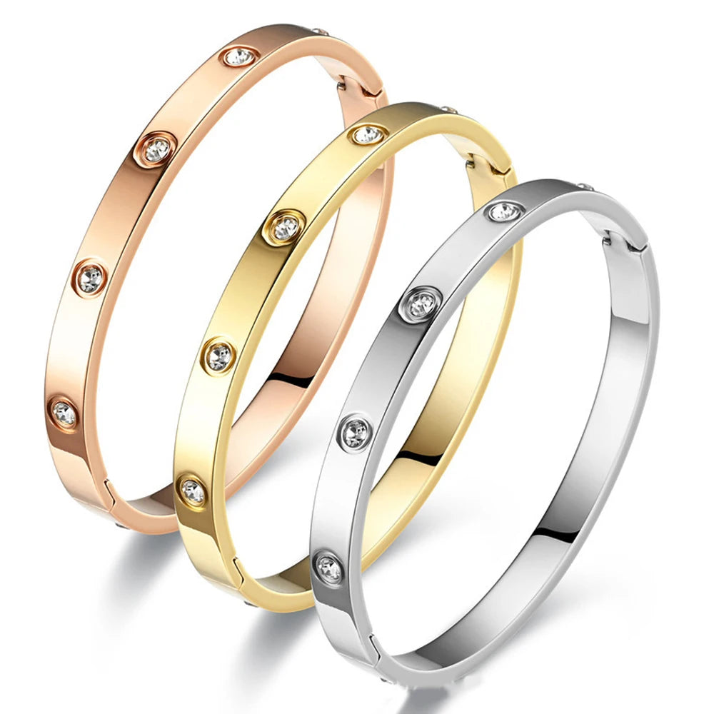 Luxury Stainless Steel Bangle for Women with Crystal Accents Fashion Jewelry Bracelet in elegant gold, silver, and rose gold.