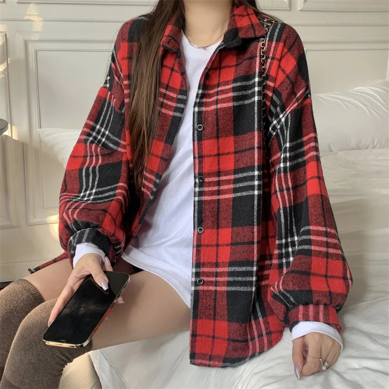 Cozy up in the Women’s Oversized Plaid Flannel Shacket Button Down Long Sleeve Check Shirt Jacket for fall and winter layering.