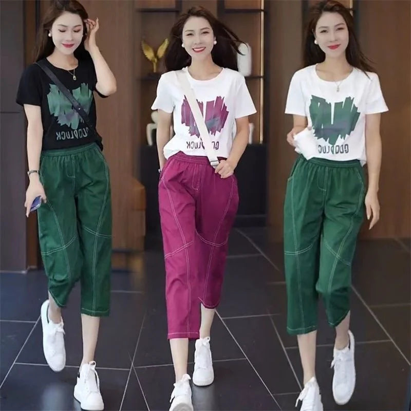 Stylish Women's Casual Summer Two Piece Set with Short Sleeve T-Shirt and Calf-Length Pants, perfect for warm weather.