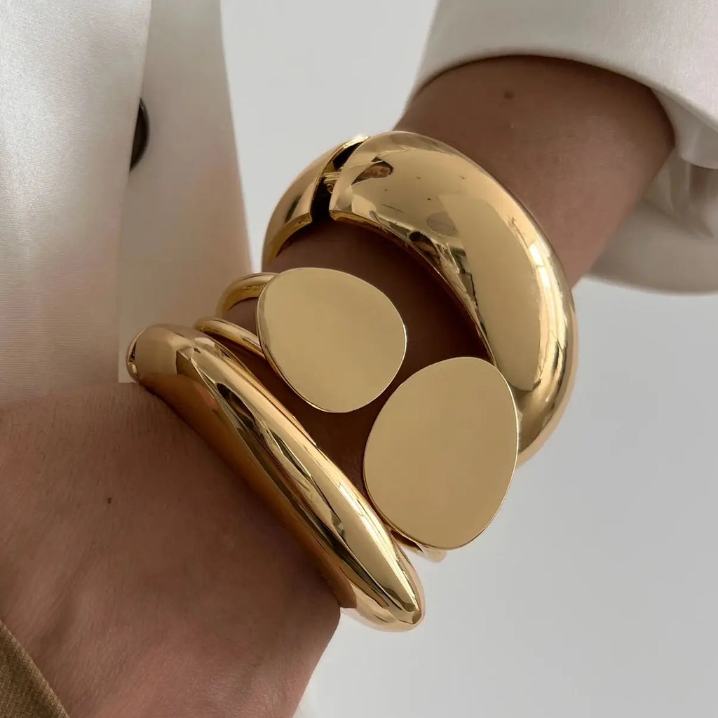 Stylish Chunky Heavy Metal Cuff Bangles for Women and Men in Gold and Silver Color, perfect for bold fashion statements.