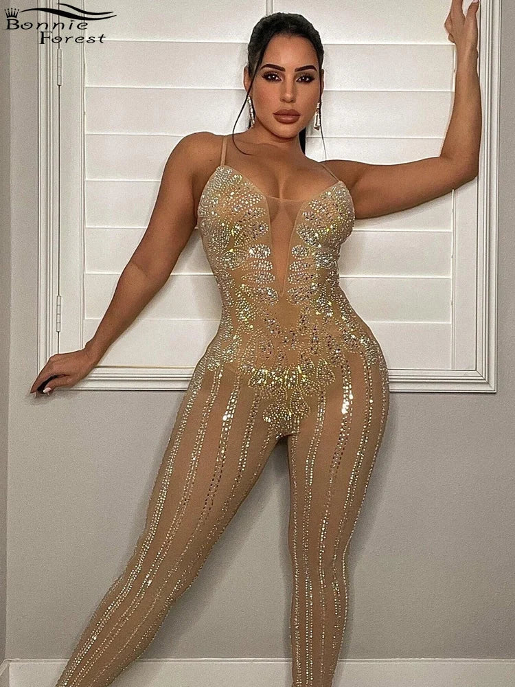 Showcasing the Women’s Sparkle Black Rhinestone Spaghetti Strap Jumpsuit, this Bonnie Forest romper is perfect for glam clubwear.