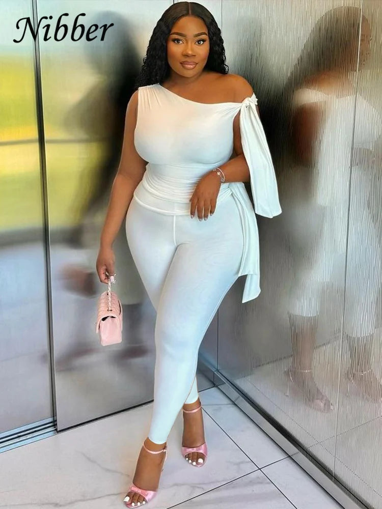 Stylish Nibber Elegant Two-Piece Women’s Tracksuit Set with Skew Collar Ribbon Tank Top and Stretch Skinny Leggings.