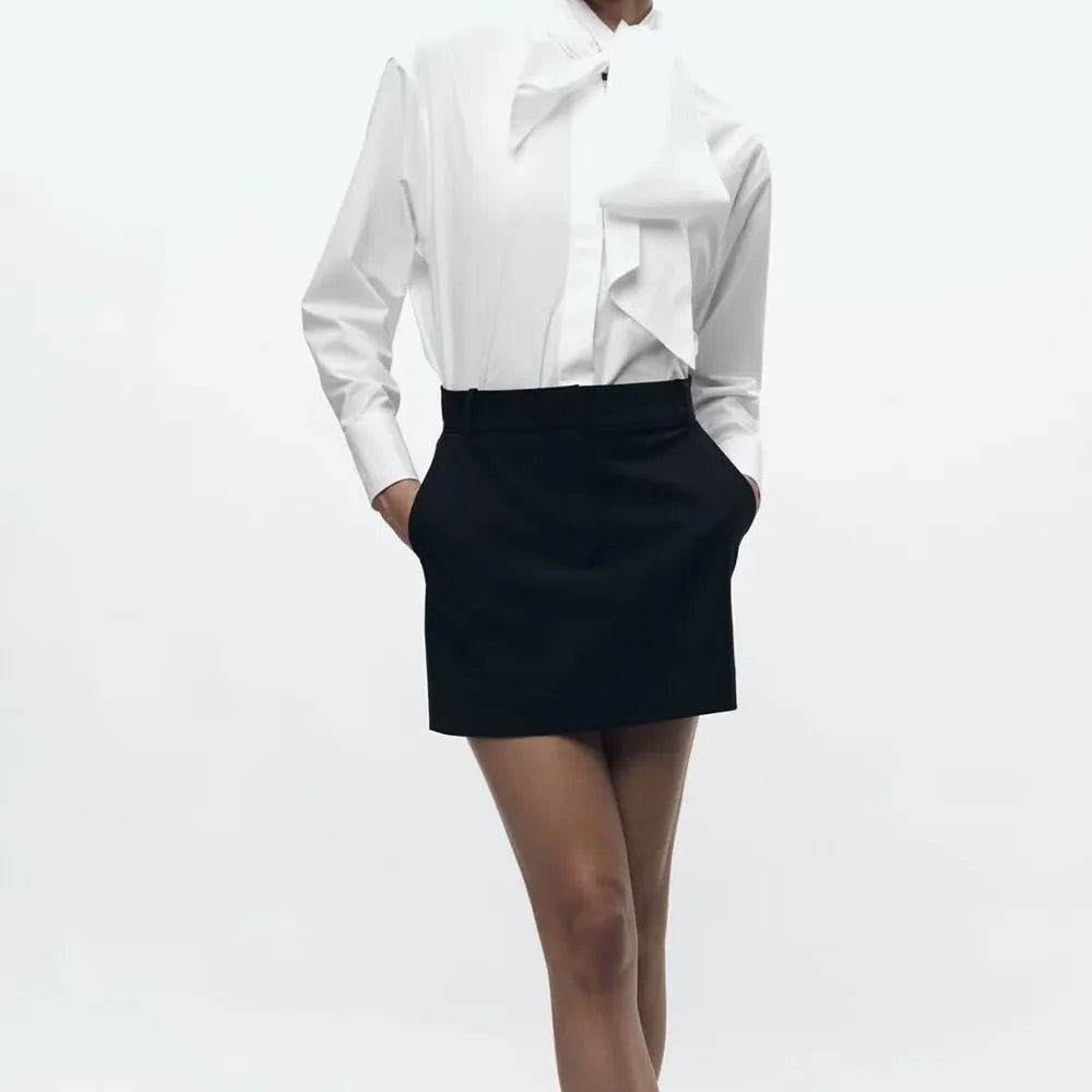 Stylishly showcase the Pure White Slim Fit Poplin Shirt with Elegant Bow Decoration, perfect for lightweight spring and summer fashion.