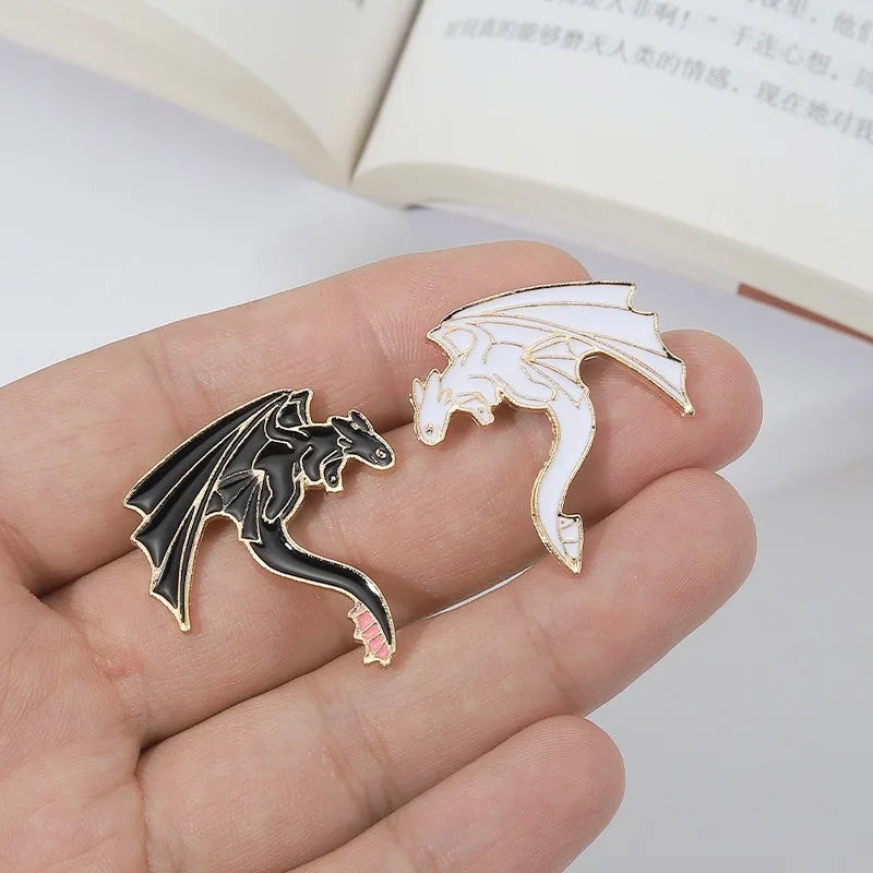 Cartoon Black and White Pterosaur Brooch Metal Enamel Badge for Clothing and Bag Accessories, a trendy accessory for your collection.