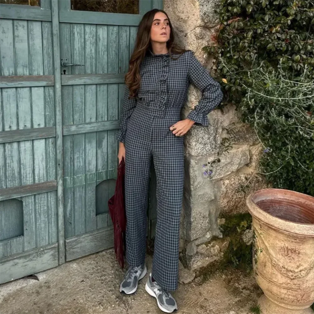 Stylish woman wearing a Women’s Casual Plaid Bubble Sleeve Long Jumpsuit Versatile Fashionable Temperament Fit by PB&ZA.