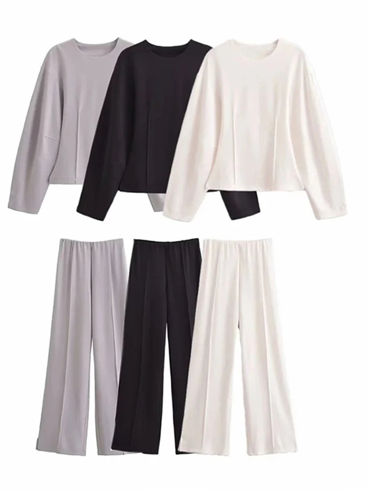 Stylish Women's Two Piece Crop Top and Wide Leg Trouser Set with Long Sleeve Round Neck Coat for Spring Streetwear.
