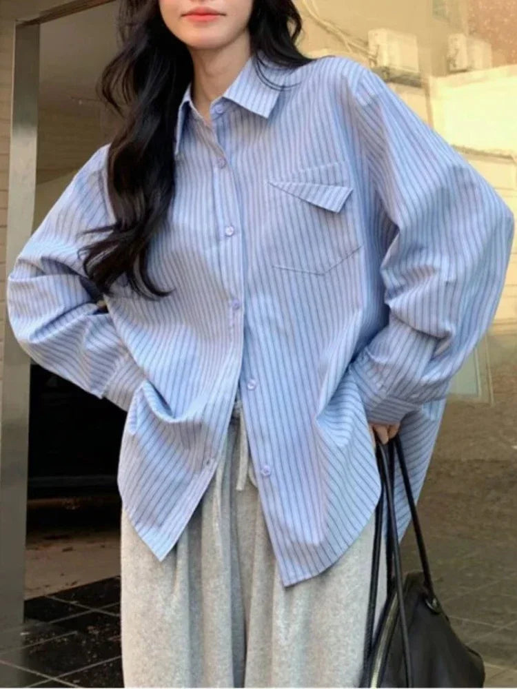 Loose Blue Striped Long Sleeve Blouse with Pocket Casual Versatile Shirt for Women, perfect for stylish comfort and versatility.
