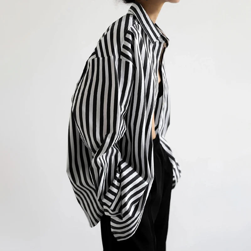 Stylish Women Black and White Striped Button Down Shirt, an oversized long sleeve boyfriend blouse for a casual loose fit.