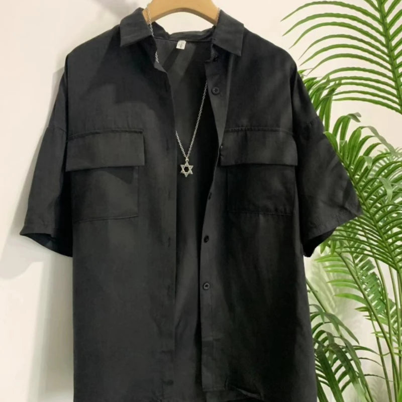 Stylish Women’s Black Blouse with Necklace Decoration, loose fit, short sleeves, and pocket for summer fashion by DAYIFUN.