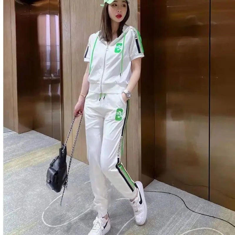 Stylish Women’s Casual Two Piece Set Zipper Hooded Short Sleeve Crop Top and Pants Spring Summer Fashion Suit for any occasion.