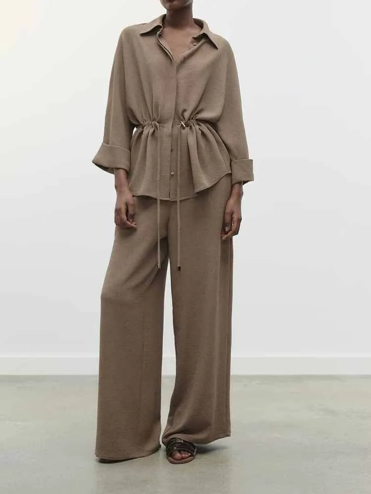 Stylish Safari Style Long Sleeve Drape Shirt and High Waist Pants Suit for Women, perfect for chic and versatile outfits.
