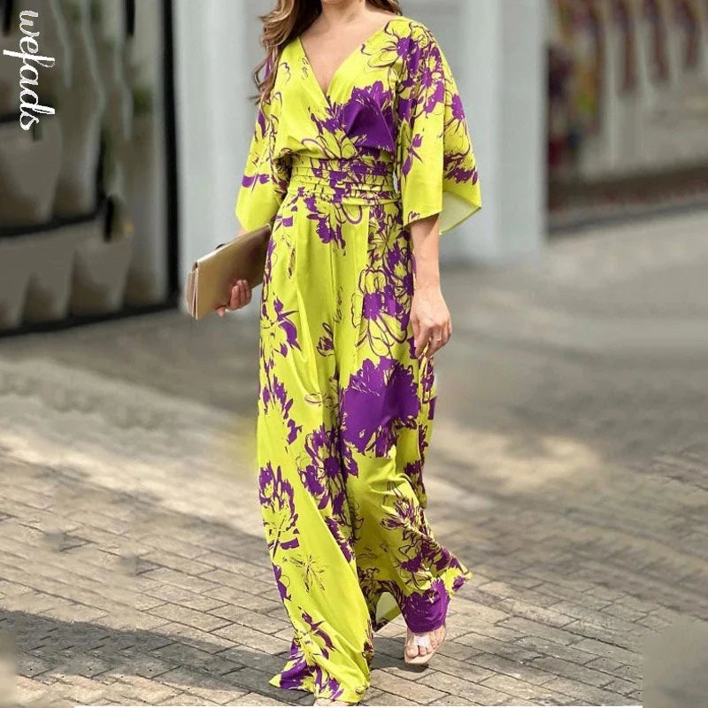 Bright and stylish, this Women’s Summer Casual Printed Jumpsuit with Batwing Sleeves V Neck Backless Tie Waist Wide Leg Romper by Wefads is perfect for warm outings.