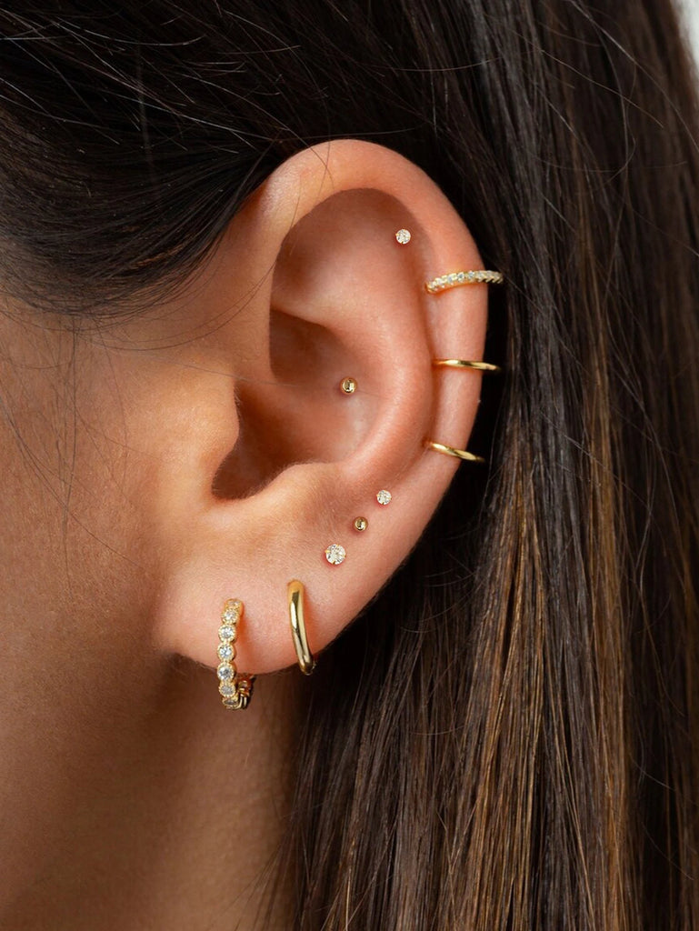 Stylish 10 Pairs Small Gold Hoop Earrings for Women, 18K Gold Plated Tiny Stainless Steel Studs for Multiple Piercings.