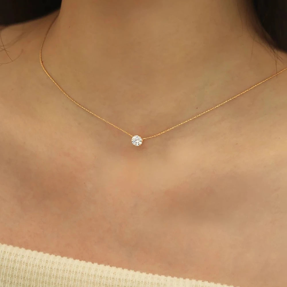 Stainless Steel Gold Plated Minimalist Zircon Charm Necklace with Clear CZ Stone for Women, perfect for any jewelry collection.