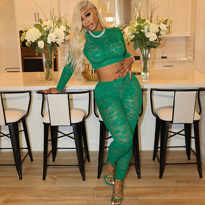 Stylish model showcases the Sexy Lace Sheer Long-Sleeve Crop Top and Cut-Out Pencil Pants Women's Two-Piece Fashion Set.