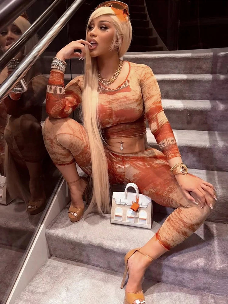 Stylish see through women 2 piece set sexy print crop top and leggings matching summer outfit for trendy outings.