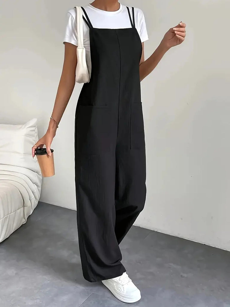 Stylish Casual Women’s Pure Black Jumpsuit with Pockets and Adjustable Shoulder Straps, perfect for workwear or leisure.