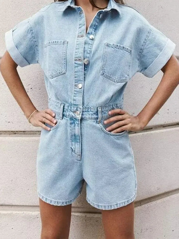 Stylish Women's Denim Short Jumpsuit Slim Fit with Lapel Collar, Curled Short Sleeves, and Patch Pockets for summer fun.