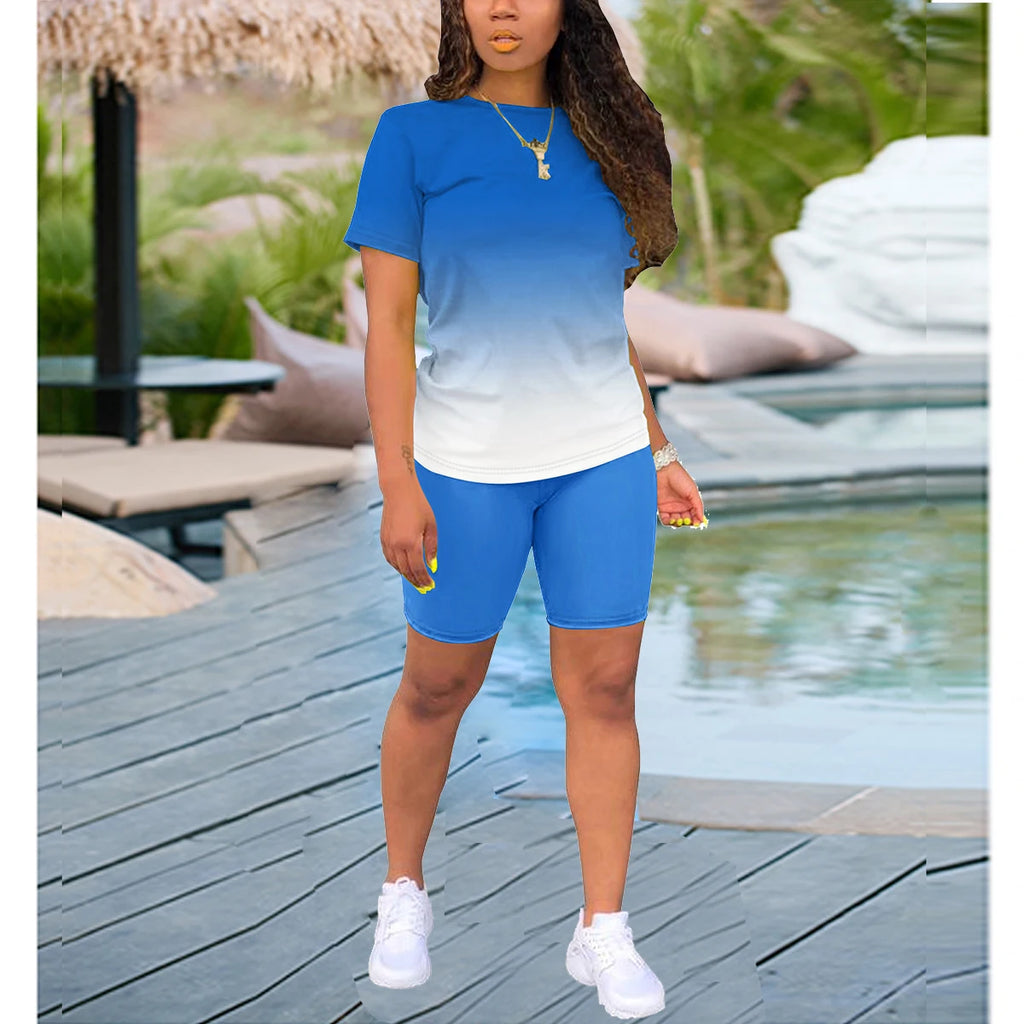 Womens Gradient Two-Piece Summer Jogging Suit Lightweight Breathable Short Sleeve Top and Fitted Shorts for casual workouts.