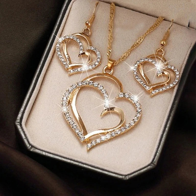 Elevate your style with the Heart Shaped Jewelry Set for Women featuring exquisite earrings, pendant, and rhinestone accents.