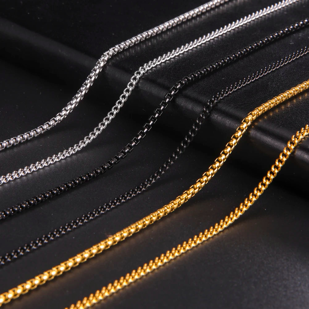 Stylish 60cm Long Stainless Steel Box Chain Necklace for Men in Black and Gold Color Fashion Punk Jewelry displayed elegantly.