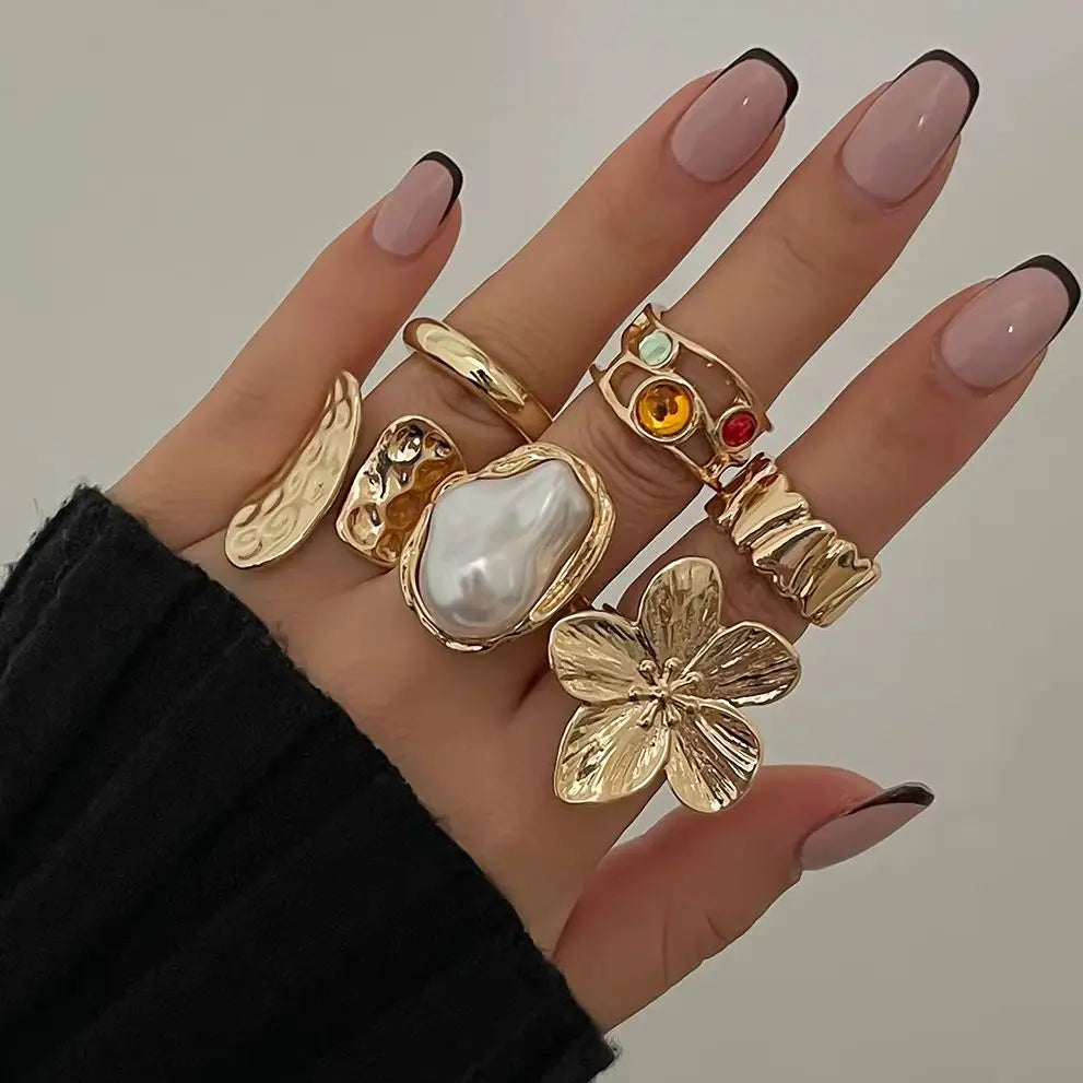 Stylish Irregular Exaggerated Metal Flower Open Rings Set for Women with Imitation Pearl, perfect for elegant baroque accessories.