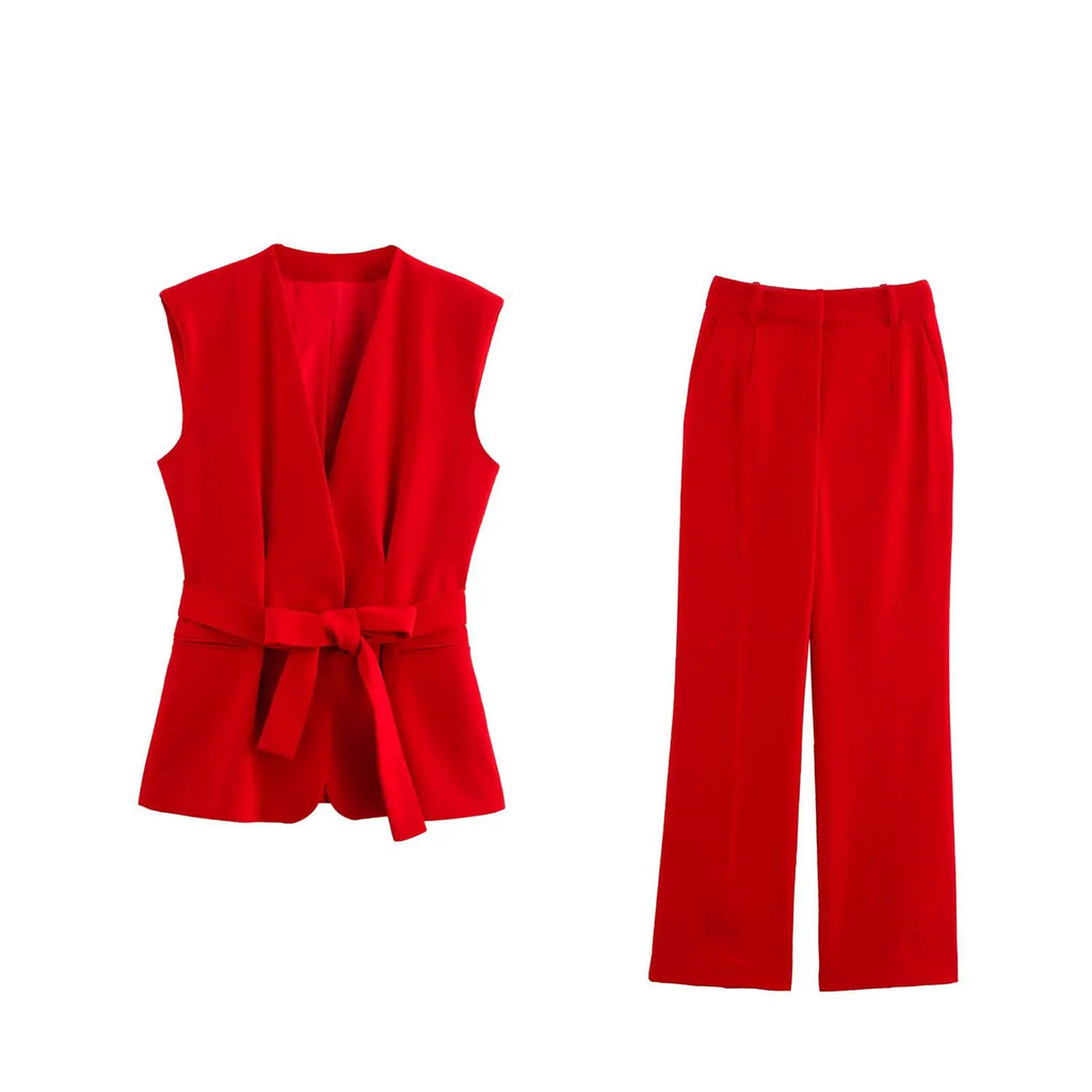 Stylish Women's Belted V-neck Vest Top with Shoulder Pads and Pockets paired with Flared Pants for a chic spring look.
