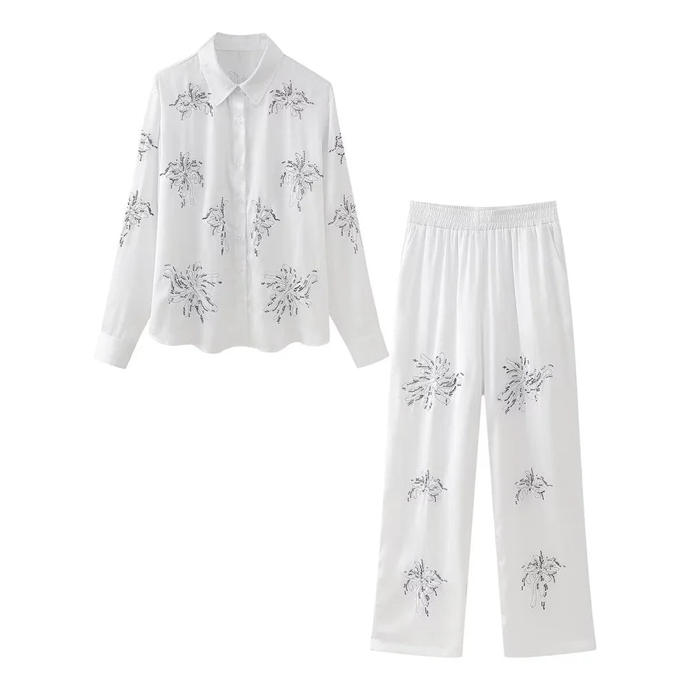 Elevate your style with the Women’s Fashion Flip Collar Beaded Embroidered Shirt with High Waist Straight Leg Pants Casual Set.