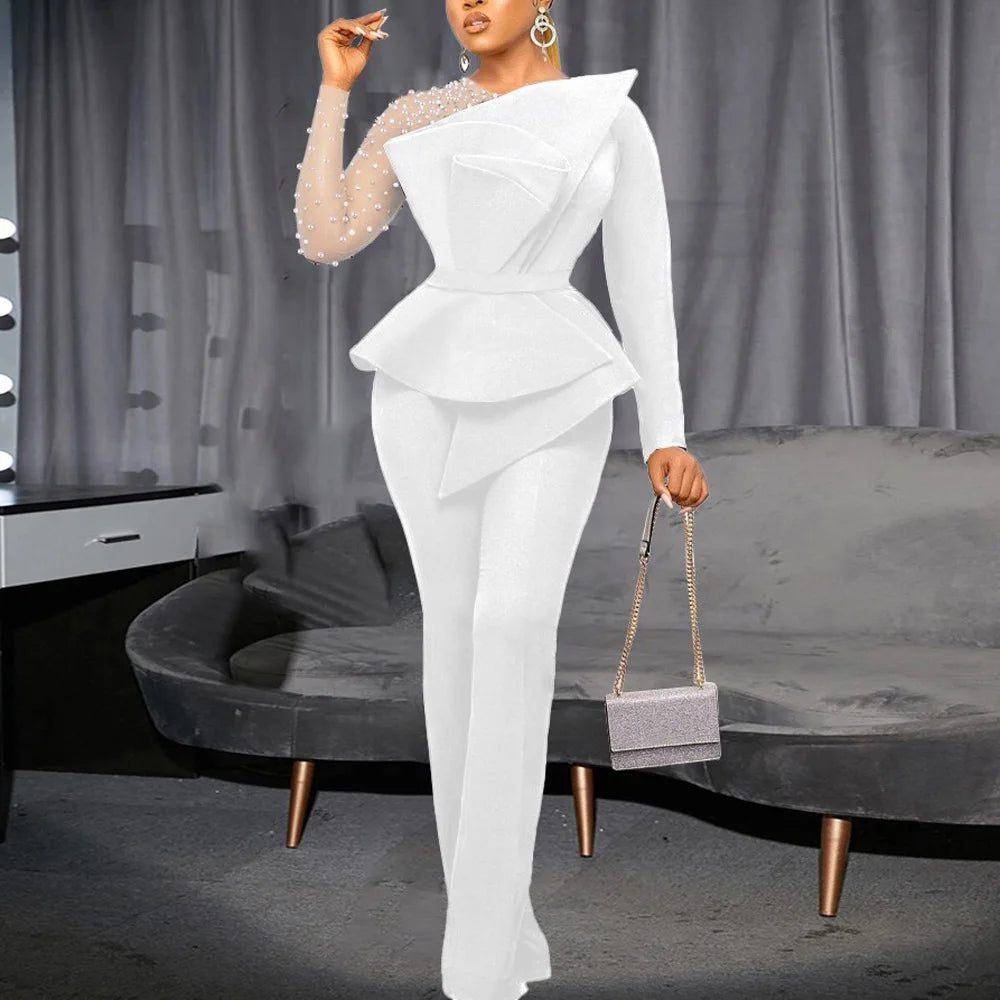 Elegant High Waisted Jumpsuit for Women with Round Neck Beaded Detail and Transparent Sleeves, ideal for special occasions.