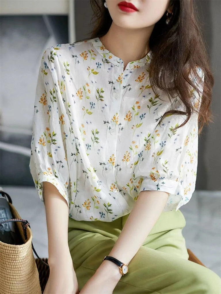 Stylish Women Casual Summer Blouse with Short Puff Sleeves and Stand Collar Featuring Elegant Flower Print, perfect for warm days.