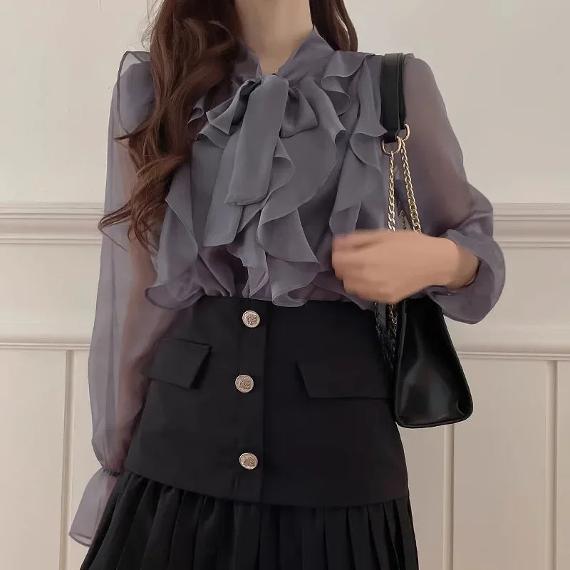Stylish woman wearing a Chic Korean Style Chiffon Blouse with sweet bow tie, perfect for office and casual summer looks.