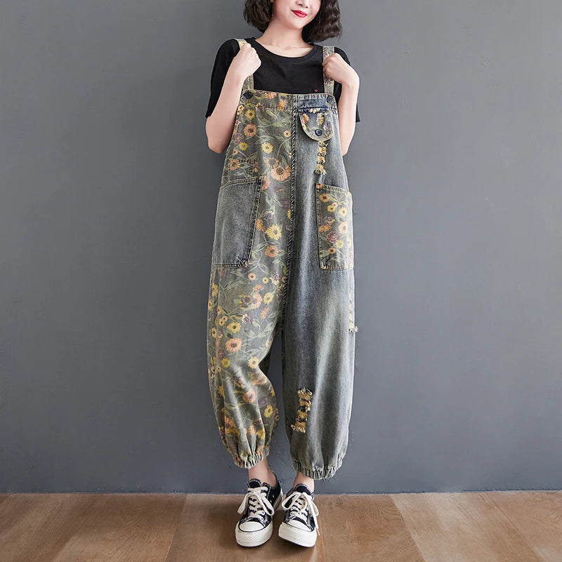 Casual Oversized Floral Print Denim Overalls for Women feature a loose fit and wide legs, perfect for a stylish, relaxed look.